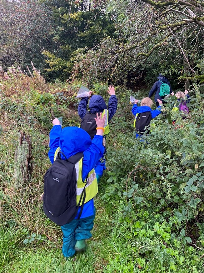 Children taking part in Forest School