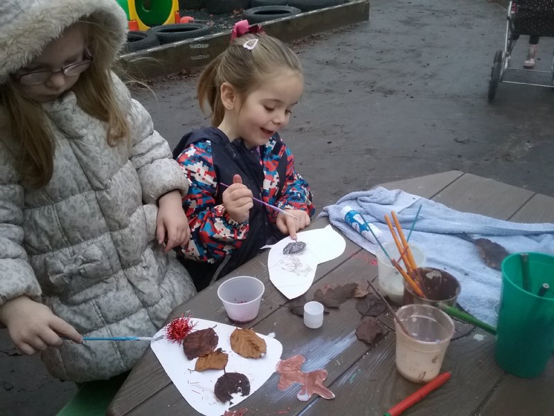 children making leaf pictures